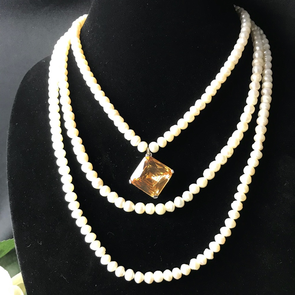 Freshwater pearls 3 strand necklace.